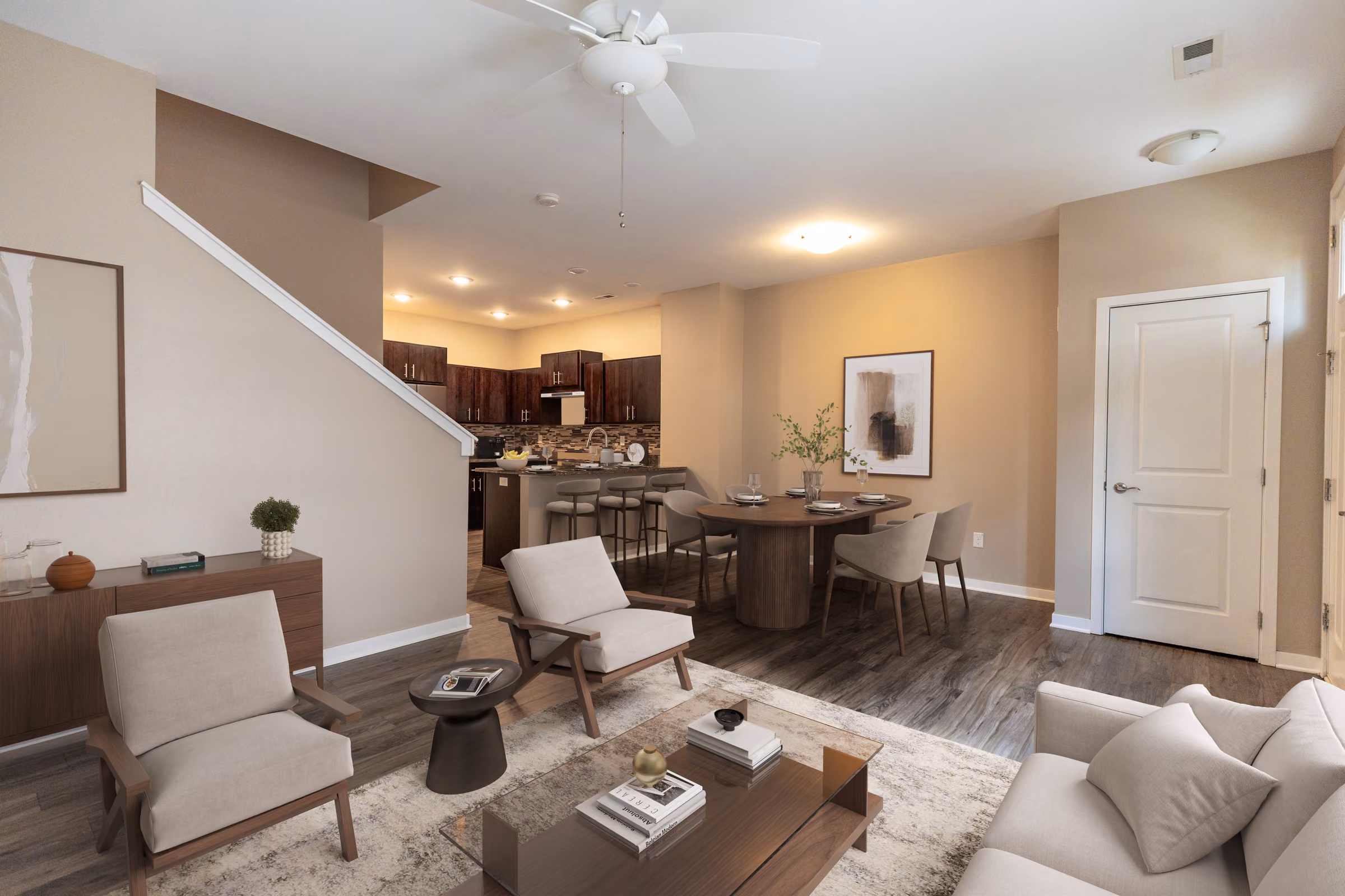 Staged open living and dining space in a 7th Street Brownstones residence